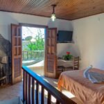 Acomodações casal Pousada Arco-Íris em São Thomé das Letras